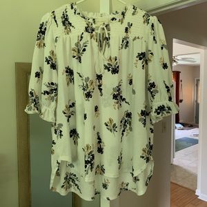 Brand new floral blouse.